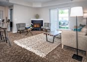 Thumbnail 19 of 55 - Arbors at Turnberry pet friendly apartments and townhomes Pickerington, Ohio spacious living room with carpet flooring and natural light