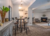 Thumbnail 14 of 55 - Arbors at Turnberry pet friendly apartments and townhomes Pickerington, Ohio spacious living room with a kitchen and dining area