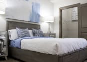 Thumbnail 18 of 25 - A bedroom with a generously sized closet is available in apartments for rent.