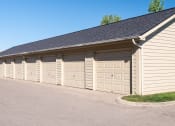 Thumbnail 21 of 27 - a row of garage doors in a row