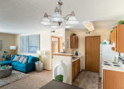 Thumbnail 6 of 27 - a kitchen and living room in a 555 waverly unit