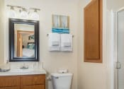 Thumbnail 12 of 27 - a bathroom with a toilet sink and shower