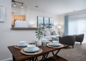 Thumbnail 6 of 21 - Dining area at Catalina Club featuring a wooden table and matching chairs, perfect for hosting meals.