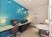 Thumbnail 21 of 25 - The business center at Austin Park Apartments offers complimentary computer access for residents who work from home.