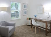Thumbnail 9 of 19 - Work-from-home-ready bedroom with a desk and chair in a 555 Waverly unit