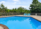 Thumbnail 39 of 50 - Patchen Oaks Apartments - Sparkling Pool with Sundeck