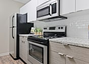 Thumbnail 22 of 50 - Patchen Oaks Apartments - Updated Kitchens with Stainless Steel Appliances