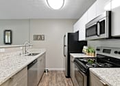 Thumbnail 20 of 50 - Patchen Oaks Apartments - Updated Kitchens with Stainless Steel Appliances