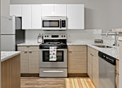 Thumbnail 10 of 50 - Patchen Oaks Apartments - Updated Kitchens with Stainless Steel Appliances