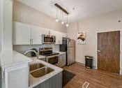 Thumbnail 46 of 50 - Patchen Oaks Apartments - Clubhouse Kitchen