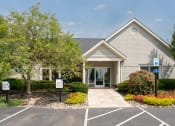 Thumbnail 22 of 25 - Clubhouse-style community building surrounded by manicured landscaping