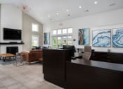 Thumbnail 14 of 25 - Lobby entrance with welcoming decor and comfortable seating area at The Coleman