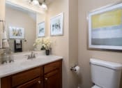 Thumbnail 18 of 23 - a bathroom with a sink toilet and mirror