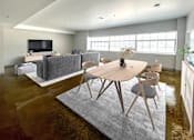 Thumbnail 12 of 19 - A modern living room with a grey rug and a wooden table.
