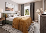 Thumbnail 2 of 14 - A bedroom with a large bed and a painting on the wall.