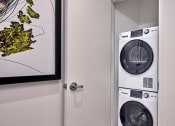 Thumbnail 59 of 61 - a white door with a washer and a dryer in it
