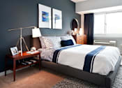 Thumbnail 13 of 17 - Model apartment bedroom