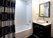 Thumbnail 14 of 17 - Bathroom sink area