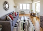 Thumbnail 16 of 17 - Living room in model apartment