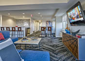 Thumbnail 5 of 17 - Resident lounge with bartstools