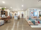 Thumbnail 9 of 11 - A spacious living room with a couch, chairs, and a dining table.
