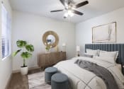 Thumbnail 17 of 51 - a bedroom with a large bed and a ceiling fan
