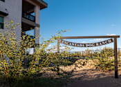Thumbnail 58 of 58 - A sign that says Cantada Dog Ranch in front of a building.