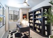 Thumbnail 19 of 51 - home office with desk and bookshelf
