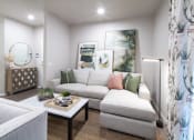 Thumbnail 22 of 51 - a living room with a couch and a coffee table