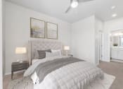 Thumbnail 33 of 51 - a bedroom with a large bed and two night stands with lamps