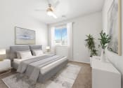 Thumbnail 36 of 51 - a bedroom with a large bed and a ceiling fan