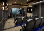 Thumbnail 10 of 23 - a large screening room with leather chairs and a movie screen