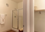 Thumbnail 46 of 51 - a bathroom with a shower and a towel rack