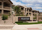 Thumbnail 33 of 34 - A sign that says Encantada Gladen Farms in front of some houses.
