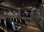 Thumbnail 7 of 29 - a conference room with chairs and a movie screen