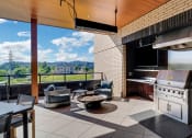 Thumbnail 41 of 53 - a kitchen and living room with a view of the sky