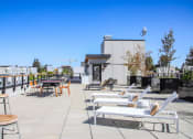 Thumbnail 52 of 53 - the terrace of the ace hotel has tables and chairs