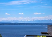 Thumbnail 38 of 38 - a view of a lake with mountains in the background