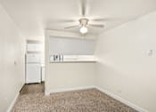 Thumbnail 13 of 26 - A room with a ceiling fan and a window with blinds.