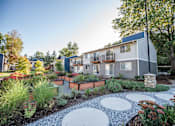 Thumbnail 3 of 49 - Kent Apartments - Driftwood Apartments - Exteriors and Gardens