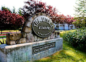 Thumbnail 22 of 25 - a sign for the willow at lincoln mall apartments