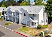 Thumbnail 24 of 25 - an aerial view of a row of white houses on a street