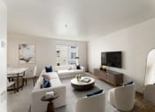 Thumbnail 1 of 29 - a living room with couches and chairs and a table