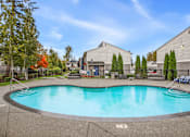 Thumbnail 16 of 49 - the preserve at ballantyne commons pool and spa with apartment buildings