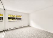 Thumbnail 42 of 49 - an empty room with white walls and a window