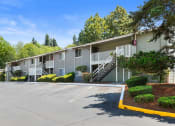 Thumbnail 13 of 22 - our apartments feature a parking lot in front of the building