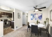 Thumbnail 5 of 35 - an open dining room and kitchen with a ceiling fan