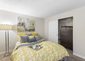 Thumbnail 15 of 35 - a bedroom with a bed and a closet