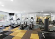 Thumbnail 21 of 35 - a gym with treadmills and other exercise equipment on a checkered floor