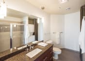 Thumbnail 15 of 20 - a bathroom with a sink toilet and shower